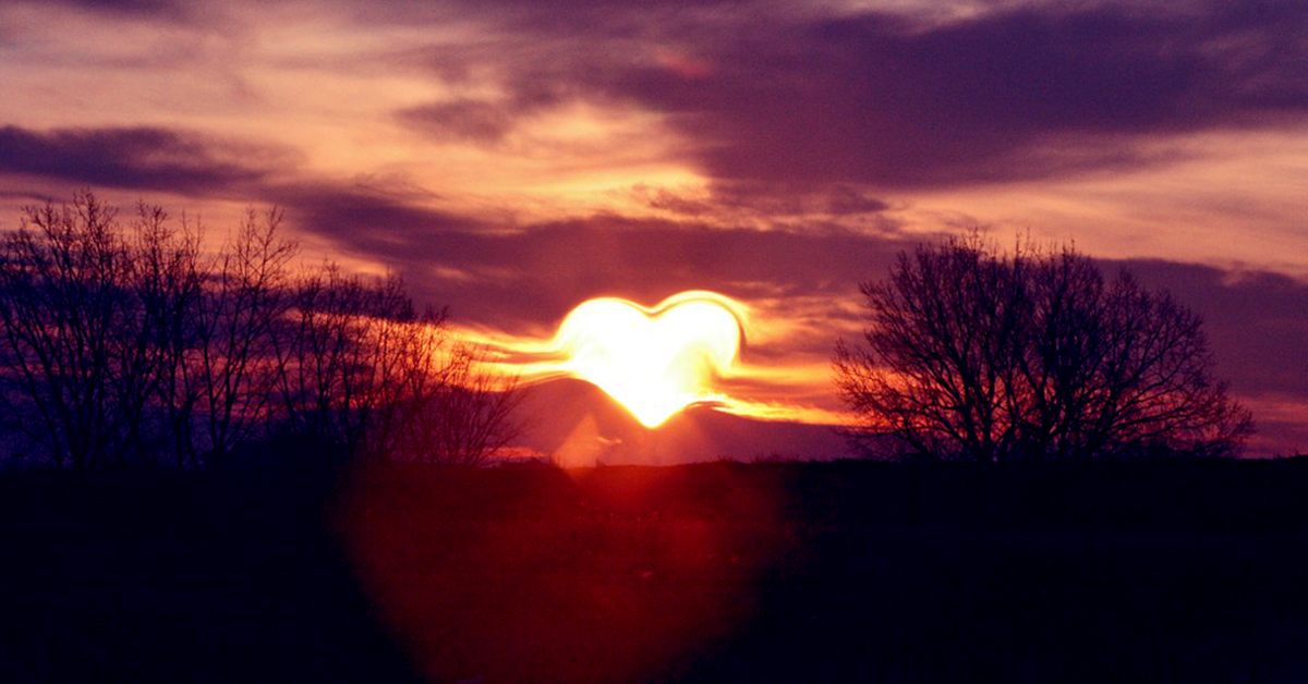Coffee Party USA - Civility Pledge - Photo of sunset with sun shaped like a heart.